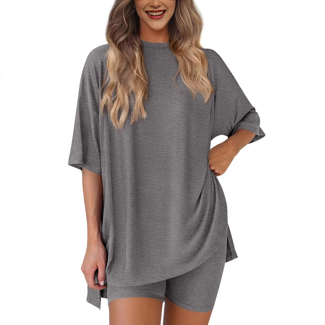 Tvådelat damset, rund halsringning, sommarlig fritidsstil, lös skjorta med slitsar i fållen, kombinerad med cykelbyxor med sidfickor, enkel loungewear, bekväma pyjamas.